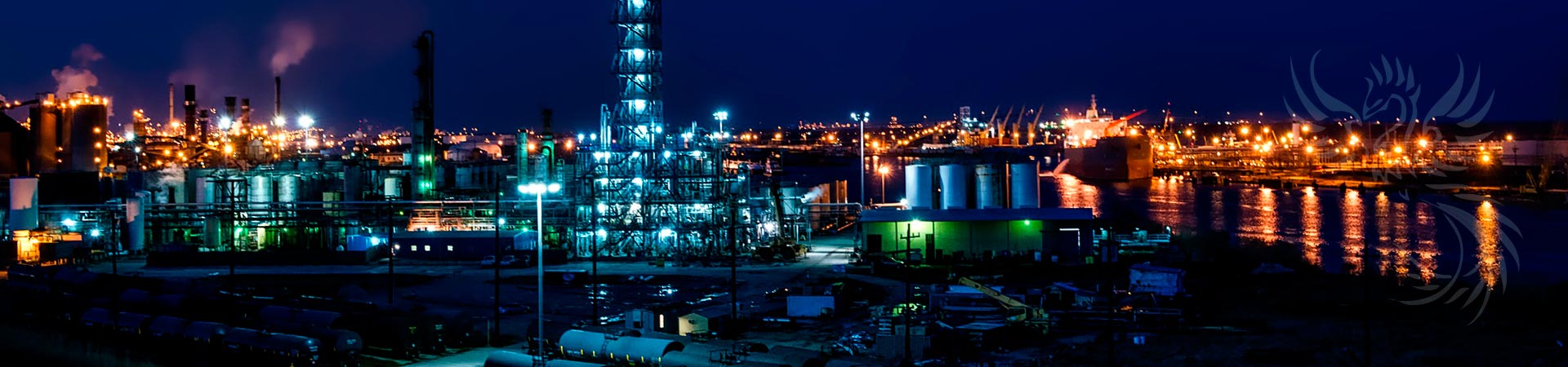 skyline at night with ske logo