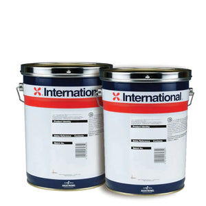 two International Paint steel drums